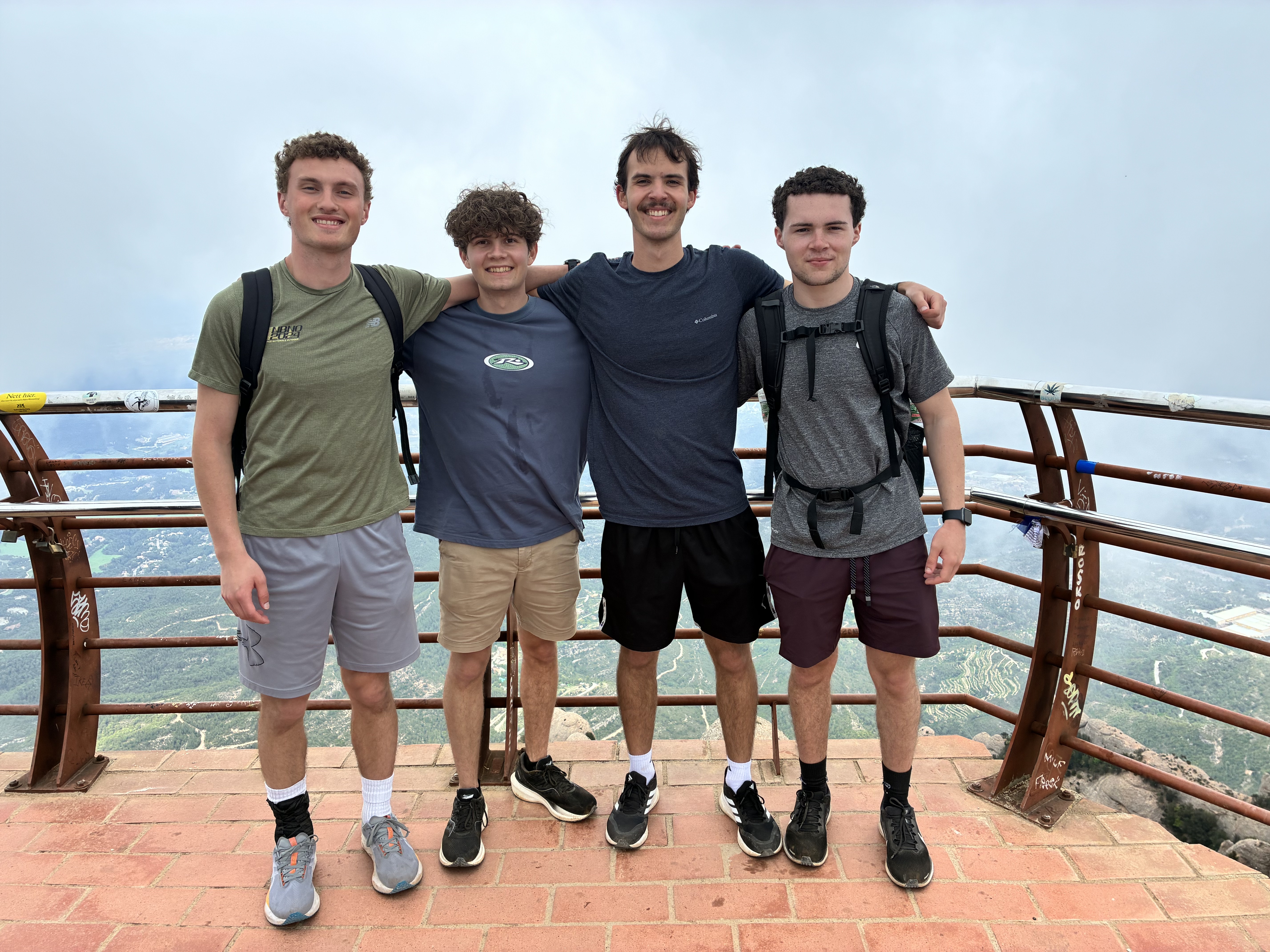 Picture of Sean and his friends at the top of Monserrat in Spain