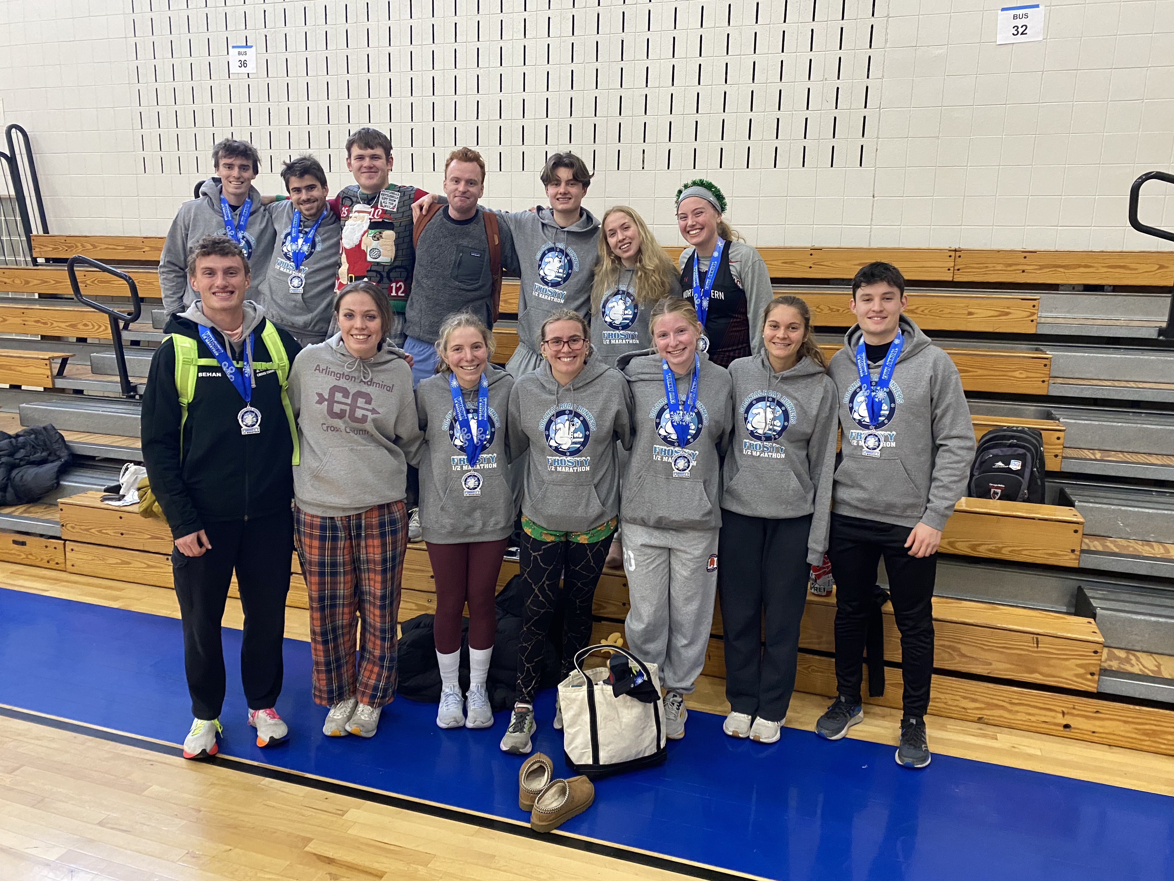 Sean and the Northeastern run club team taking a picture after the Frosty Half Marathon in Massachusetts